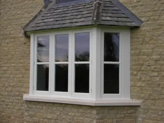 A window detail on a traditional stone building.