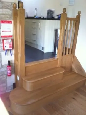 A timber staircase detail in an interior.