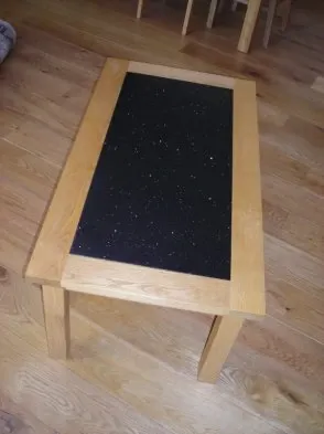A timber furniture piece viewed in an interior.